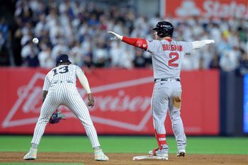 Sep 30, 2025; Bronx, New York, USA; Boston Red Sox third baseman Alex Bregman (2) celebrates his RBI double against the New York Yankees during the ninth inning of game one of the Wildcard round of the 2025 MLB playoffs at Yankee Stadium. Mandatory Credit: Brad Penner-Imagn Images