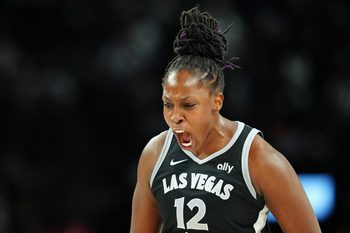 Sep 30, 2025; Las Vegas, Nevada, USA; Las Vegas Aces guard Chelsea Gray (12) celebrates after making a play against the Indiana Fever during the fourth quarter of game five of the second round for the 2025 WNBA Playoffs at Michelob Ultra Arena. Mandatory Credit: Stephen R. Sylvanie-Imagn Images