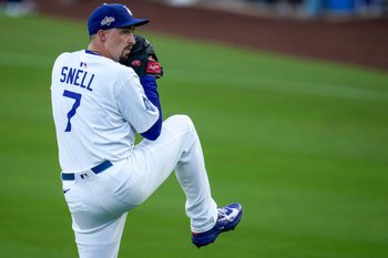 Los Angeles Dodgers starting pitcher Blake Snell (7) warms up before the first inning of the MLB National League Wild Card Game 1 between the Los Angeles Dodgers and the Cincinnati Reds at Dodger Stadium in Los Angeles on Tuesday, Sept. 30, 2025. The Dodgers won game 1 of the series, 10-5.