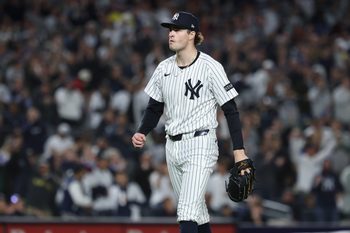 Oct 2, 2025; Bronx, New York, USA; New York Yankees pitcher Cam Schlittler (31) walks of the field after pitching the top of the sixth inning against the Boston Red Sox during game three of the Wildcard round for the 2025 MLB playoffs at Yankee Stadium. Mandatory Credit: Vincent Carchietta-Imagn Images