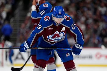 Oct 9, 2025; Denver, Colorado, USA; Colorado Avalanche center Nathan MacKinnon (29) during the second period against the Utah Mammoth at Ball Arena. Mandatory Credit: Ron Chenoy-Imagn Images