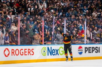 Oct 9, 2025; Vancouver, British Columbia, CAN; Vancouver Canucks forward Filip Chytil (72) celebrates his first goal of the period against the Calgary Flames in the third period at Rogers Arena. Mandatory Credit: Bob Frid-Imagn Images