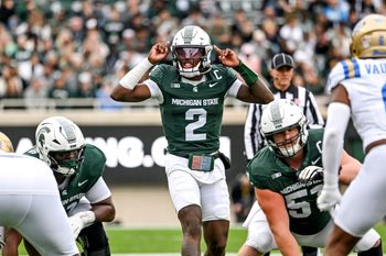 Michigan State's Aidan Chiles prepares for the snap against UCLA during the first quarter on Saturday, Oct. 11, 2025, at Spartan Stadium in East Lansing.
