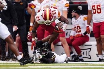 Oct 11, 2025; Boulder, Colorado, USA; Iowa State Cyclones running back Abu Sama (24) carries the ball in the second half against the Colorado Buffaloes at Folsom Field. Mandatory Credit: Ron Chenoy-Imagn Images