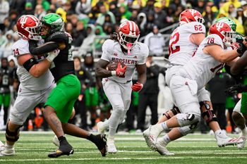 Oct 11, 2025; Eugene, Oregon, USA; Indiana Hoosiers running back Roman Hemby (1) runs the ball against the Oregon Ducks during the fourth quarter at Autzen Stadium. Mandatory Credit: Troy Wayrynen-Imagn Images