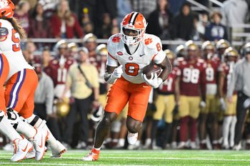 Oct 11, 2025; Chestnut Hill, Massachusetts, USA; Clemson Tigers running back Adam Randall (8) runs the ball against the Boston College Eagles during the first half at Alumni Stadium. Mandatory Credit: Eric Canha-Imagn Images