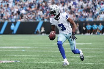 Oct 12, 2025; Charlotte, North Carolina, USA; Dallas Cowboys wide receiver George Pickens (3) runs with the ball during the first quarter against the Carolina Panthers at Bank of America Stadium. Mandatory Credit: Cory Knowlton-Imagn Images