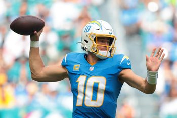 Oct 12, 2025; Miami Gardens, Florida, USA; Los Angeles Chargers quarterback Justin Herbert (10) passes the football against the Miami Dolphins during the fourth quarter at Hard Rock Stadium. Mandatory Credit: Sam Navarro-Imagn Images