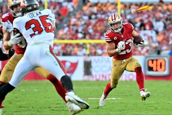 Oct 12, 2025; Tampa, Florida, USA; San Francisco 49ers running back Christian McCaffrey (23) runs for a gain during the third quarter against the Tampa Bay Buccaneers at Raymond James Stadium. Mandatory Credit: Jonathan Dyer-Imagn Images