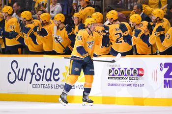 Oct 11, 2025; Nashville, Tennessee, USA;  Nashville Predators left wing Erik Haula (56) celebrates with his teammates after scoring a goal against the Utah Mammoth during the second period at Bridgestone Arena. Mandatory Credit: Steve Roberts-Imagn Images