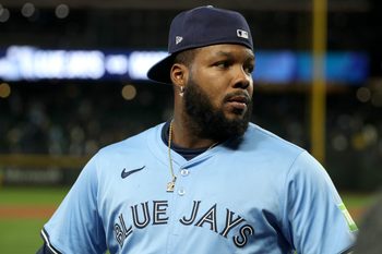 Oct 16, 2025; Seattle, Washington, USA; Toronto Blue Jays first baseman Vladimir Guerrero Jr. (27) celebrates after winning game four of the ALCS round for the 2025 MLB playoffs against the Seattle Mariners at T-Mobile Park. Mandatory Credit: Kevin Ng-Imagn Images