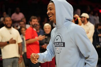 Oct 17, 2025; Miami, Florida, USA;  Memphis Grizzlies guard Ja Morant (12) who did not play due to injury, leaves the court after the Memphis Grizzlies defeat the Miami Heat at Kaseya Center. Mandatory Credit: Jim Rassol-Imagn Images