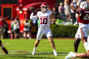 Oct 18, 2025; Columbia, South Carolina, USA; Oklahoma Sooners quarterback John Mateer (10) passes against the South Carolina Gamecocks in the second half at Williams-Brice Stadium. Mandatory Credit: Jeff Blake-Imagn Images
