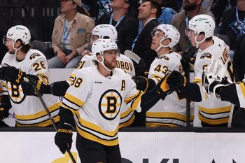 Oct 19, 2025; Salt Lake City, Utah, USA; Boston Bruins right wing David Pastrnak (88) scores a goal against the Utah Mammoth and celebrates with teammates during the first period at Delta Center. Mandatory Credit: Rob Gray-Imagn Images