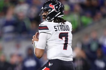 Oct 20, 2025; Seattle, Washington, USA; Houston Texans quarterback C.J. Stroud (7) looks to throw a pass during the second quarter against the Seattle Seahawks at Lumen Field. Mandatory Credit: Kevin Ng-Imagn Images