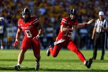 Oct 18, 2025; Tempe, Arizona, USA; Texas Tech Red Raiders running back Cameron Dickey (8) blocks for quarterback Will Hammond (15) against the Arizona State Sun Devils at Mountain America Stadium. Mandatory Credit: Mark J. Rebilas-Imagn Images