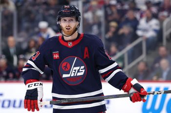 Oct 24, 2025; Winnipeg, Manitoba, CAN; Winnipeg Jets left wing Kyle Connor (81) looks on prior to a face off against the Calgary Flames in the second period at Canada Life Centre. Mandatory Credit: James Carey Lauder-Imagn Images