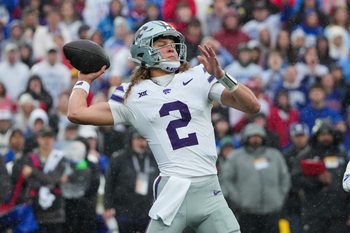 Oct 25, 2025; Lawrence, Kansas, USA; Kansas State Wildcats quarterback Avery Johnson (2) throws a pass against the Kansas Jayhawks during the first half of the game at David Booth Kansas Memorial Stadium. Mandatory Credit: Denny Medley-Imagn Images