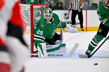 Oct 25, 2025; Dallas, Texas, USA; Dallas Stars goaltender Jake Oettinger (29) faces the Carolina Hurricanes attack during the third period at the American Airlines Center. Mandatory Credit: Jerome Miron-Imagn Images