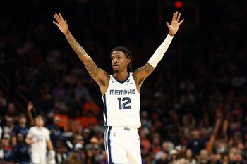 Oct 29, 2025; Phoenix, Arizona, USA; Memphis Grizzlies guard Ja Morant (12) reacts against the Phoenix Suns during the second half at the Mortgage Matchup Center. Mandatory Credit: Mark J. Rebilas-Imagn Images