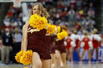 Mar 18, 2022; Pittsburgh, PA, USA; against the Loyola (Il) Ramblers cheerleaders in the first half against the Ohio State Buckeyes during the first round of the 2022 NCAA Tournament at PPG Paints Arena. Mandatory Credit: Geoff Burke-Imagn Images