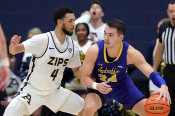 Akron Zips guard Trendon Hankerson, left, guards against South Dakota State guard Alex Arians during the second half of an NCAA college basketball game, Monday, Nov. 7, 2022, in Akron, Ohio.

Zipsmbb 14