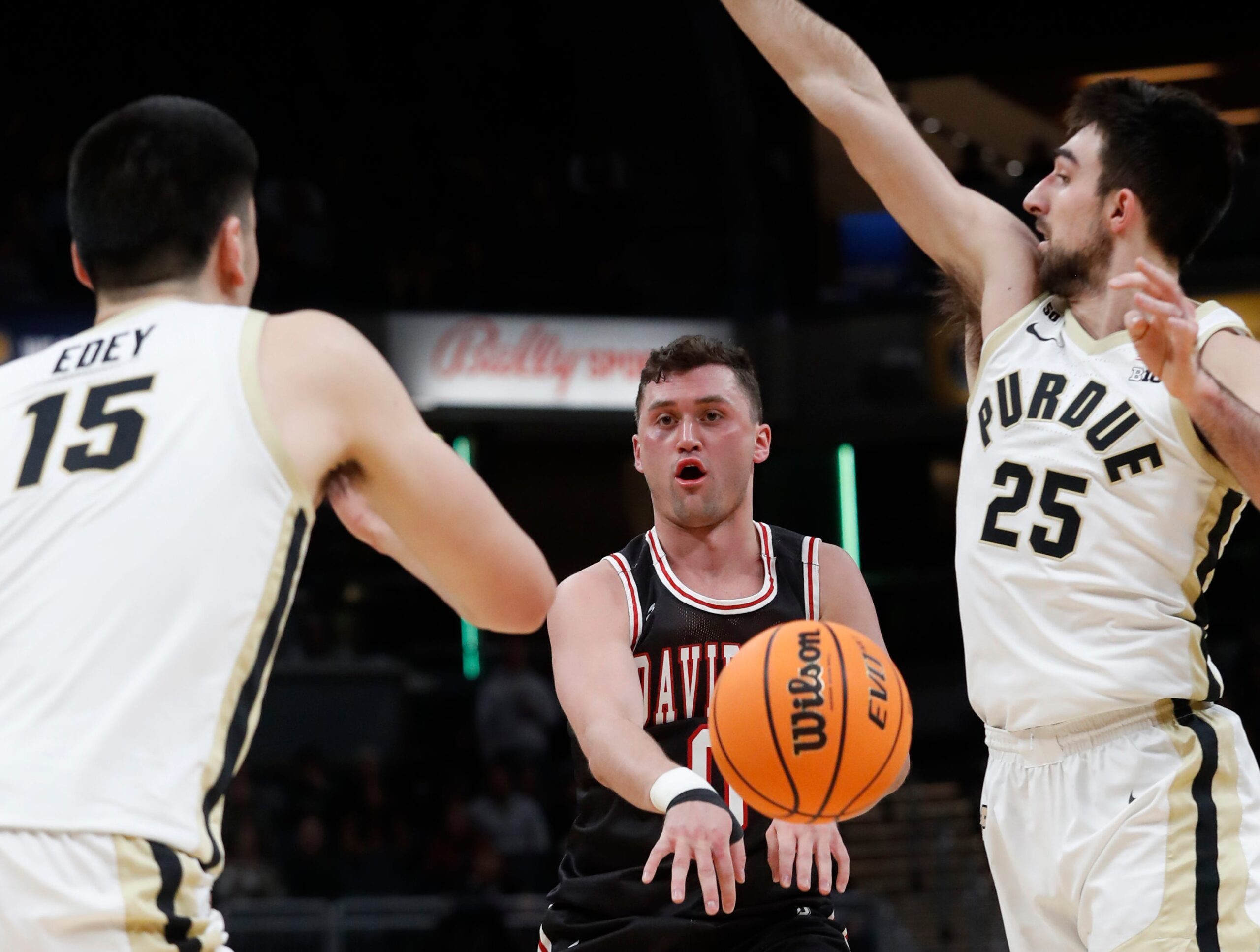 Davidson Wildcats guard Foster Loyer (0) passes the ball during the Indy Classic NCAA men   s basketball doubleheader against the Purdue Boilermakers, Saturday, Dec. 17, 2022, at Gainbridge Fieldhouse in Indianapolis. Purdue won 69-61.

Purduedavidsonmbb121722 Am14189