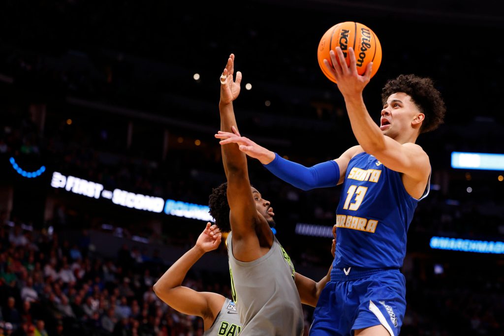 Mar 17, 2023; Denver, CO, USA; UC Santa Barbara Gauchos guard Ajay Mitchell (13) drives to the basket against Baylor Bears during the first half in the first round of the 2023 NCAA men s basketball tournament at Ball Arena. Mandatory Credit: Michael Ciaglo-Imagn Images