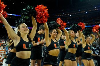 Apr 1, 2023; Houston, TX, USA; The Miami (Fl) Hurricanes cheerleaders perform before the game against the Connecticut Huskies in the semifinals of the Final Four of the 2023 NCAA Tournament at NRG Stadium. Mandatory Credit: Bob Donnan-Imagn Images