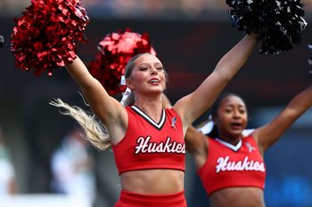 Sep 21, 2024; DeKalb, Illinois, USA; Northern Illinois Huskies cheerleaders perform during a timeout during the first half at Huskie Stadium. Mandatory Credit: Mike Dinovo-Imagn Images