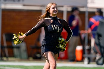 Oct 12, 2024; Winston-Salem, North Carolina, USA; Wake Forest Demon Deacons cheerleader during the first half against the Clemson Tigers at Allegacy Federal Credit Union Stadium. Mandatory Credit: Jim Dedmon-Imagn Images