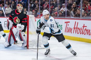 Jan 26, 2025; Ottawa, Ontario, CAN; Utah left wing Matias Maccelli (63) chases the puck in the second period against the Ottawa Senators at the Canadian Tire Centre. Mandatory Credit: Marc DesRosiers-Imagn Images