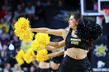 Jan 29, 2025; Wichita, Kansas, USA;  Wichita State Shockers cheerleaders perform during the first half against the North Texas Mean Green at Charles Koch Arena. Mandatory Credit: William Purnell-Imagn Images