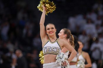 Feb 15, 2025; Atlanta, Georgia, USA; A Georgia Tech Yellow Jackets cheerleader performs against the California Golden Bears in the second half at McCamish Pavilion. Mandatory Credit: Brett Davis-Imagn Images