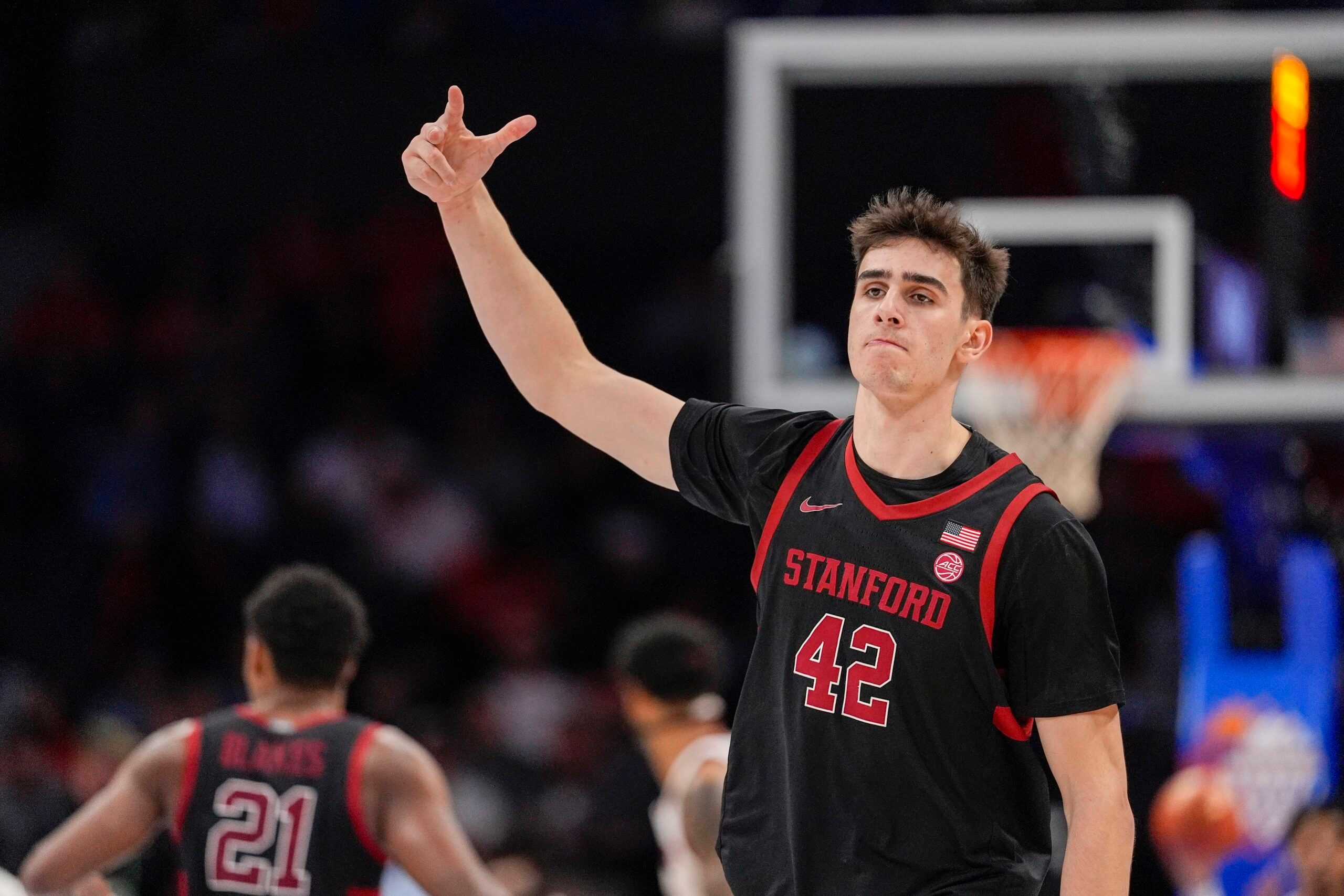 Mar 13, 2025; Charlotte, NC, USA; Stanford Cardinal forward Maxime Raynaud (42) after a dunk against the Louisville Cardinals during the second half at Spectrum Center. Mandatory Credit: Jim Dedmon-Imagn Images