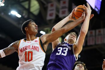 Mar 8, 2025; College Park, Maryland, USA; Maryland Terrapins forward Julian Reese (10) and Northwestern Wildcats forward Luke Hunger (33) battle for a rebound during the first half at Xfinity Center. Mandatory Credit: Reggie Hildred-Imagn Images