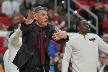 Mar 21, 2025; Raleigh, NC, USA;  Oklahoma Sooners head coach Porter Moser reacts during the second half against the Connecticut Huskies at Lenovo Center. Mandatory Credit: Zachary Taft-Imagn Images