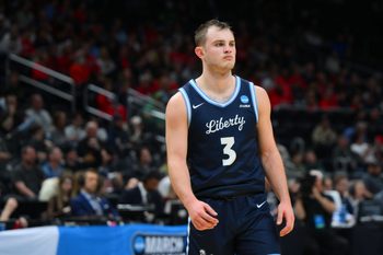 Mar 21, 2025; Seattle, WA, USA; Liberty Flames guard Kaden Metheny (3) reacts during the second half in the first round of the NCAA Tournament at Climate Pledge Arena. Mandatory Credit: Steven Bisig-Imagn Images