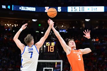 Mar 23, 2025; Milwaukee, WI, USA;  Kentucky Wildcats forward Andrew Carr (7) and Illinois Fighting Illini forward Ben Humrichous (3) go after the ball during the first half in the second round of the NCAA Tournament at Fiserv Forum. Mandatory Credit: Benny Sieu-Imagn Images