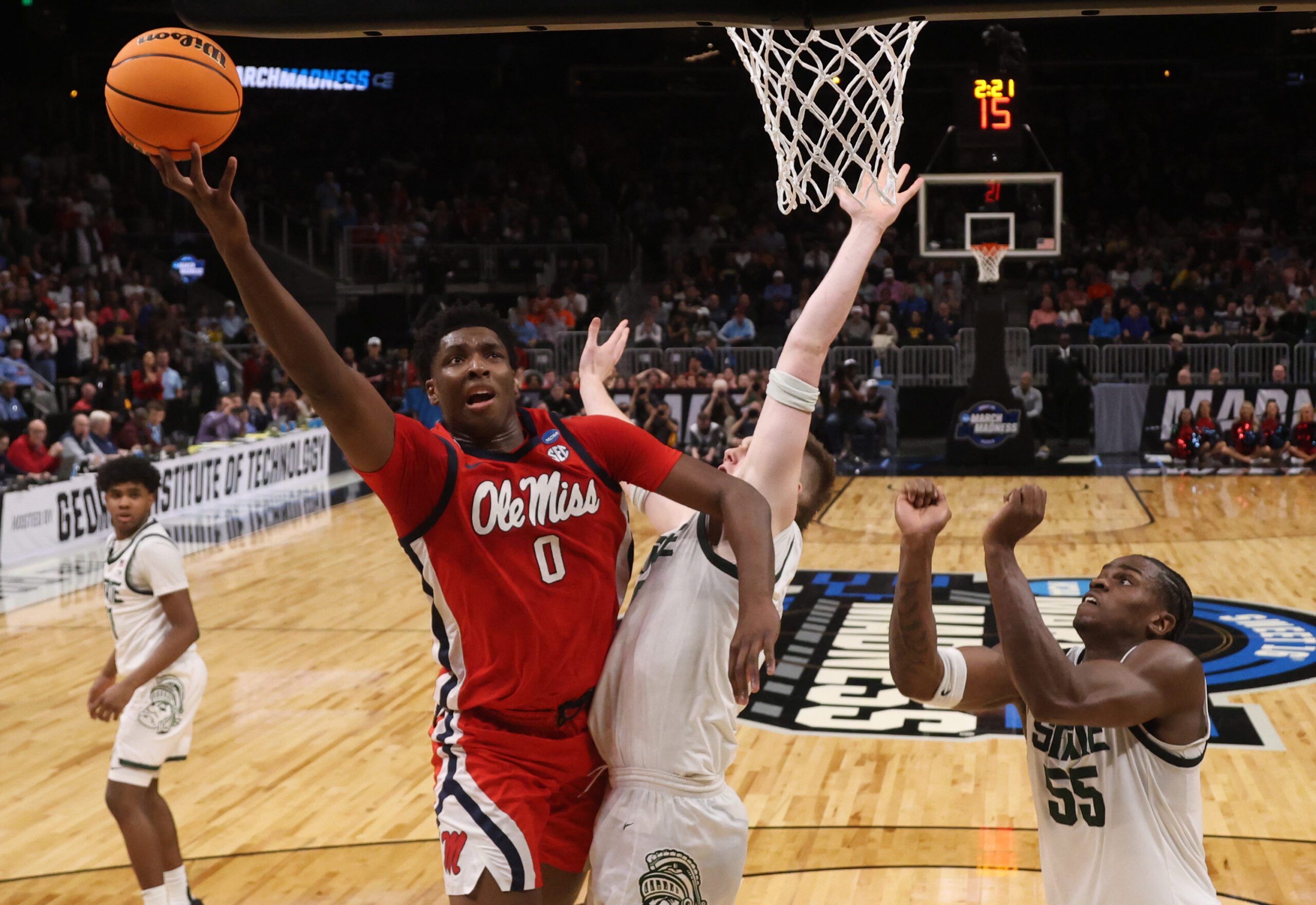 Mar 28, 2025; Atlanta, GA, USA; Mississippi Rebels forward Malik Dia (0) shoots against Michigan State Spartans forward Jaxon Kohler (0) in the first half of a South Regional semifinal of the 2025 NCAA tournament at State Farm Arena. Mandatory Credit: Brett Davis-Imagn Images
