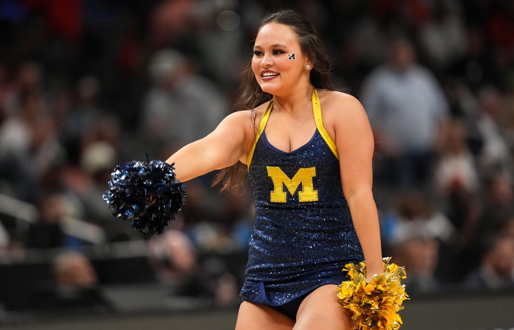 Mar 28, 2025; Atlanta, GA, USA; Michigan Wolverines cheerleaders in the second half of a South Regional semifinal of the 2025 NCAA tournament against the Auburn Tigers at State Farm Arena. Mandatory Credit: Brett Davis-Imagn Images
