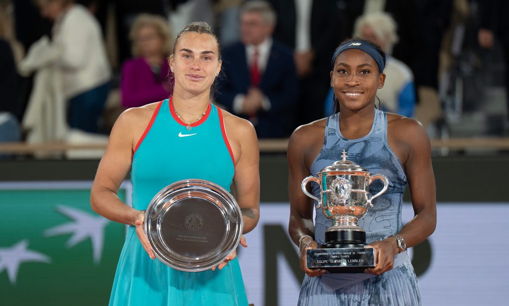 Jun 7, 2025; Paris, FR; Coco Gauff of the United States poses with Aryna Sabalenka after their match on day 14 at Roland Garros Stadium. Mandatory Credit: Susan Mullane-Imagn Images
