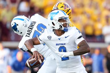 Aug 28, 2025; Minneapolis, Minnesota, USA; Buffalo Bulls quarterback Ta'Quan Roberson (2) looks to throw against the Minnesota Golden Gophers during the first half of the game at Huntington Bank Stadium. Mandatory Credit: Matt Krohn-Imagn Images