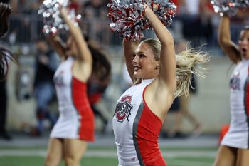 Sep 13, 2025; Columbus, Ohio, USA;  Ohio State Buckeyes cheerleader cheer during the second half against the Ohio Bobcats at Ohio Stadium. Mandatory Credit: Joseph Maiorana-Imagn Images
