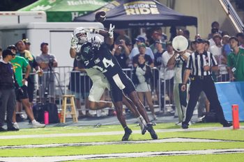 Oct 11, 2025; Honolulu, Hawaii, USA;  Hawaii Rainbow Warriors defensive back Devyn King (24) breaks up a catch intended for Utah State Aggies wide receiver Braden Pegan (11) during the first half at Clarence T.C. Ching Athletics Complex. Mandatory Credit: Marco Garcia-Imagn Images