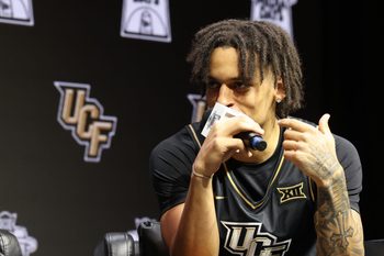 Oct 22, 2025; Kansas City, MO, USA; UCFs Riley Kugel speaks to media during Big 12 Menís Basketball media day at T-Mobile Center. Mandatory Credit: Sophia Scheller-Imagn Images