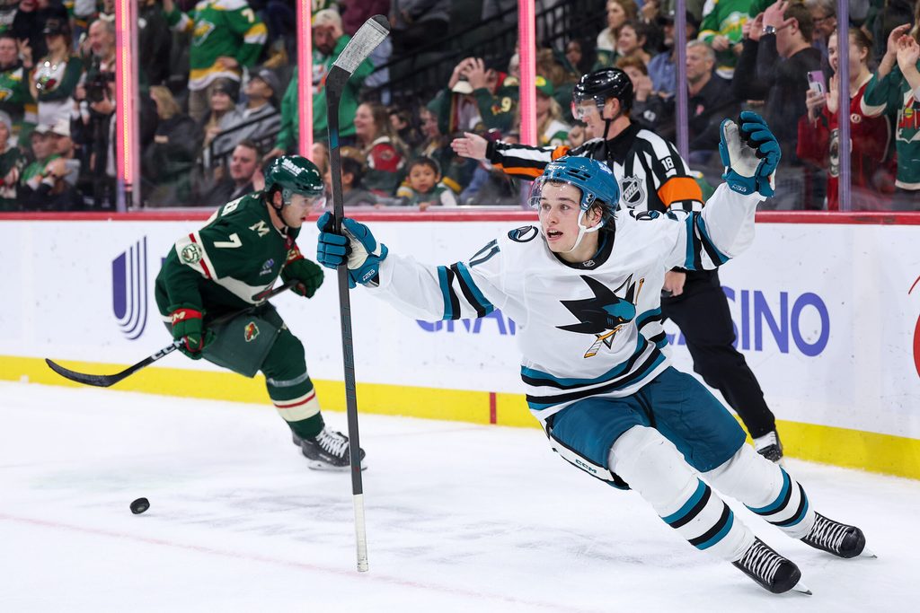 Oct 26, 2025; Saint Paul, Minnesota, USA; San Jose Sharks center Macklin Celebrini (71) celebrates his game winning overtime goal against the Minnesota Wild at Grand Casino Arena. Mandatory Credit: Matt Krohn-Imagn Images
