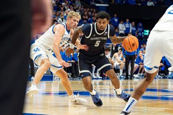 Georgetown’s KJ Lewis (5) drove to the basket for a score as the Kentucky Wildcats host the Georgetown Hoyas at Rupp Arena in Lexington on Thursday, Oct. 30, 2025.
