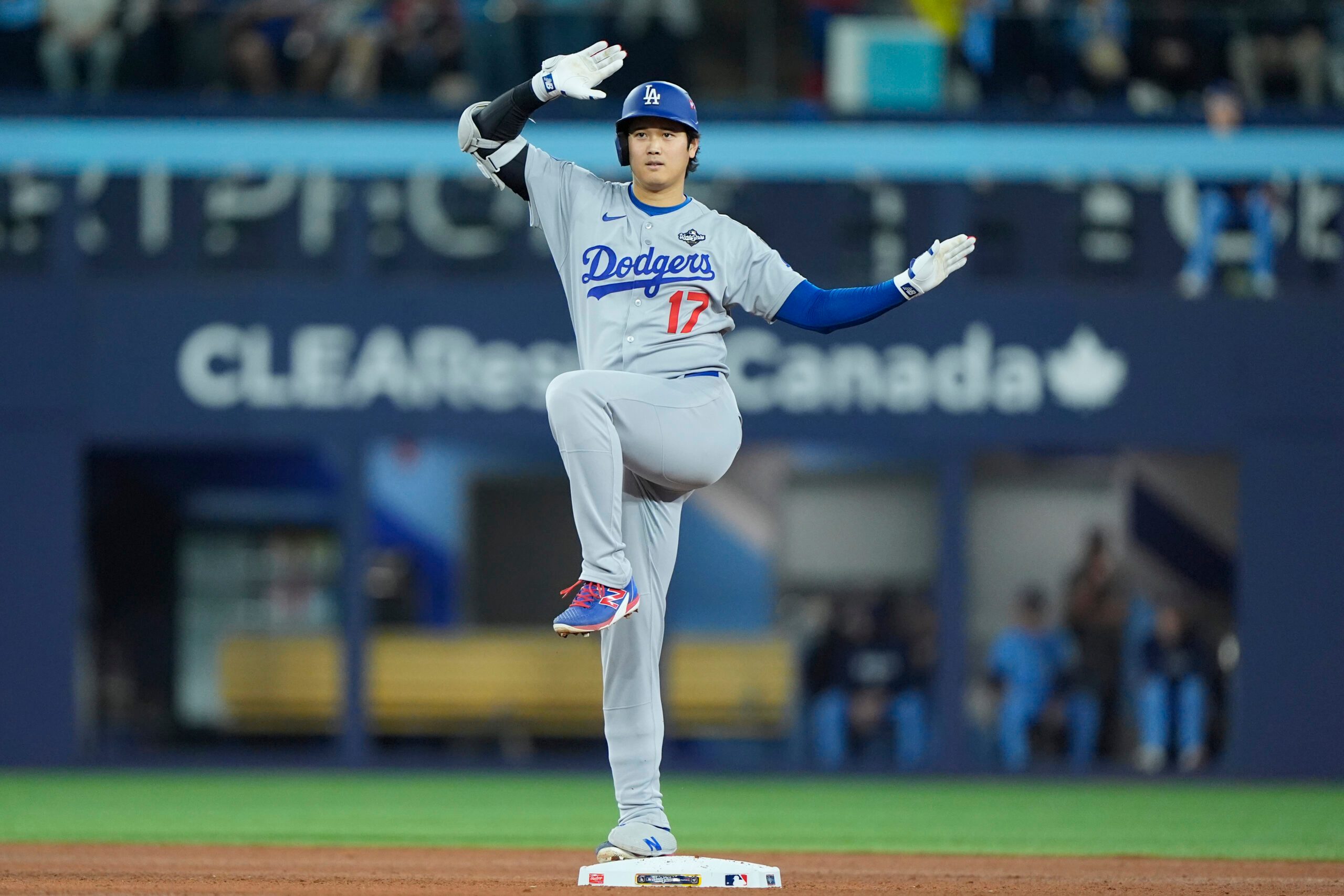 Oct 31, 2025; Toronto, Ontario, CAN; Los Angeles Dodgers two-way player Shohei Ohtani (17) celebrates after hitting a double against the Toronto Blue Jays in the eighth inning during game six of the 2025 MLB World Series at Rogers Centre. Mandatory Credit: John E. Sokolowski-Imagn Images