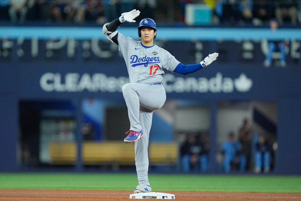 Oct 31, 2025; Toronto, Ontario, CAN; Los Angeles Dodgers two-way player Shohei Ohtani (17) celebrates after hitting a double against the Toronto Blue Jays in the eighth inning during game six of the 2025 MLB World Series at Rogers Centre. Mandatory Credit: John E. Sokolowski-Imagn Images